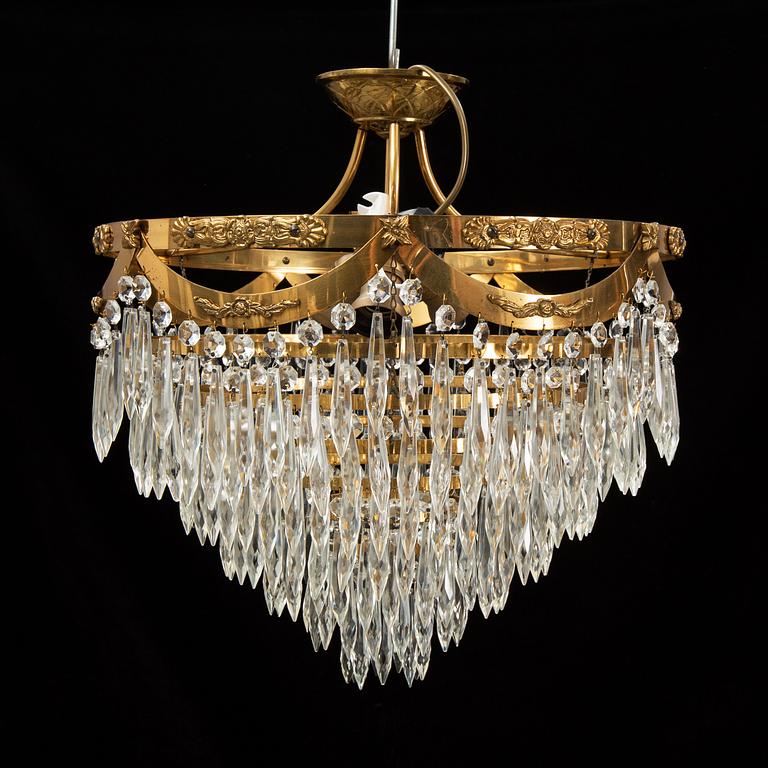 An end of the 20th Century ceiling light with prisms.