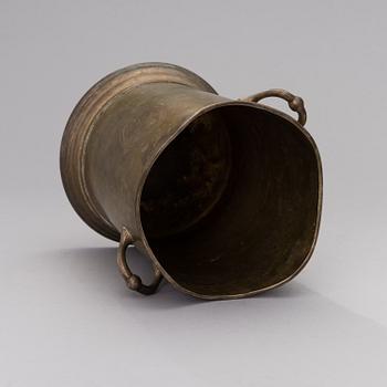 A Louis Roederer champagne cooler of silver plated brass.