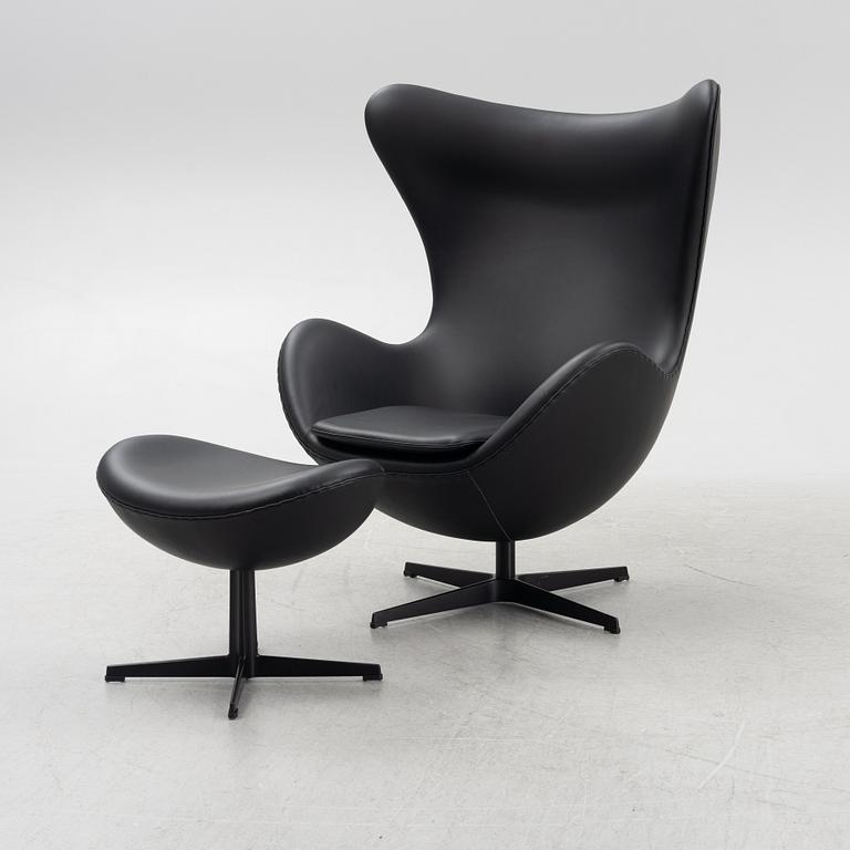 Arne Jacobsen, an "Egg" lounge chair with ottoman, Fritz Hansen, Denmark, 2022.