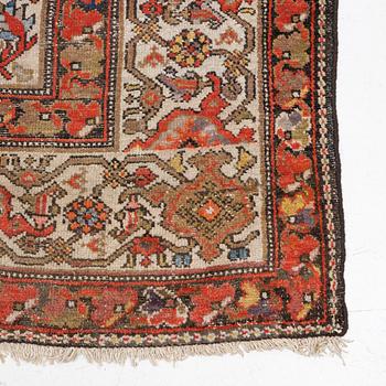 An antique Malayer carpet, west persia c 402 x 178 cm.