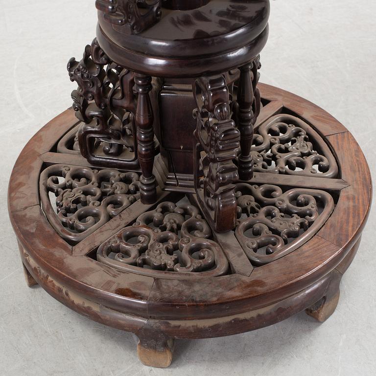 A Chinese wooden table, early 20th century.