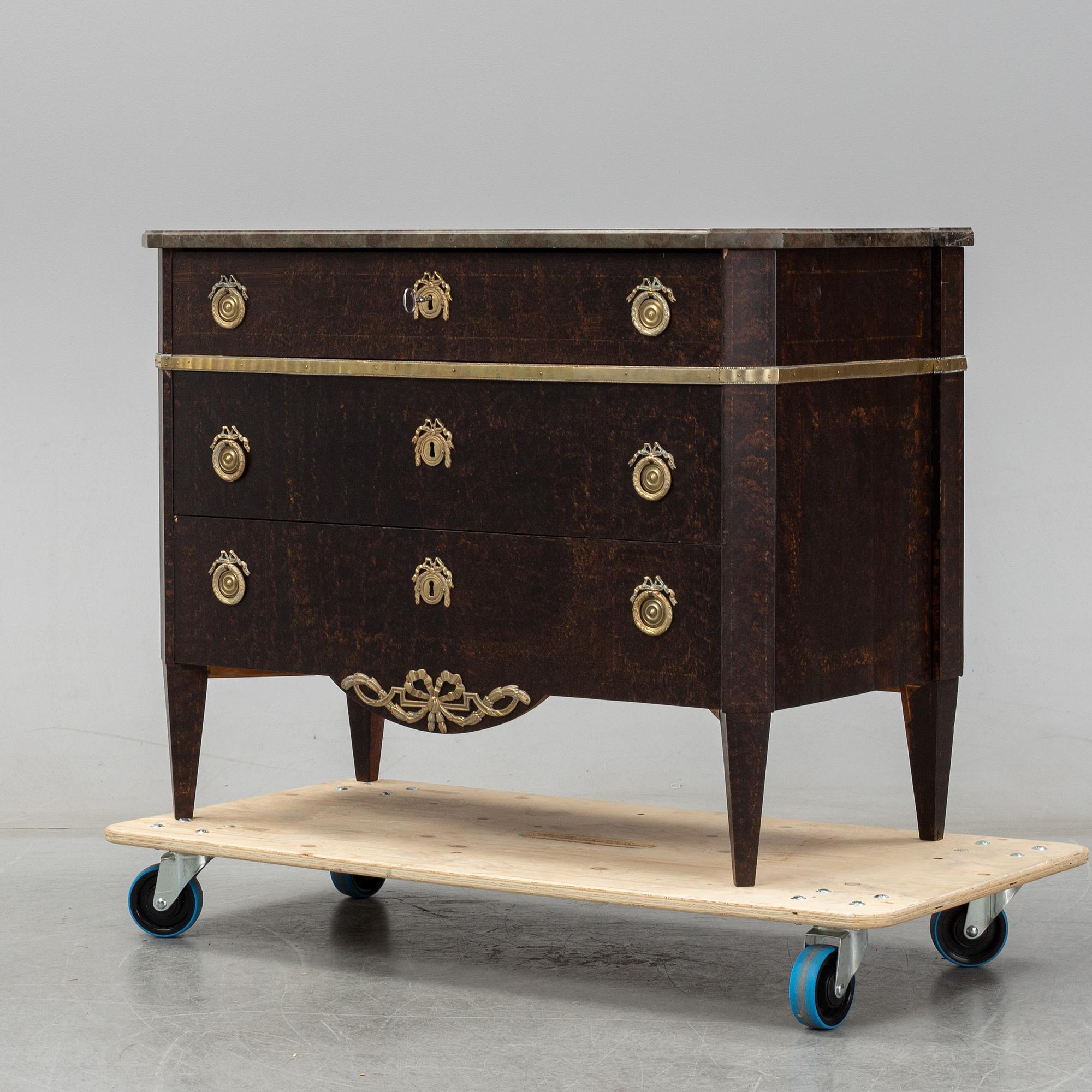 A gustavian style chest of drawers, early 20th century.