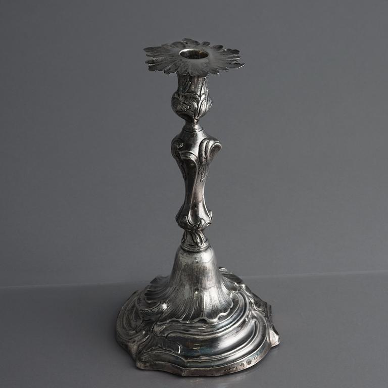 Two Swedish Rococo silver candlesticks, marks of Jakob Lampa, Stockholm 1764 and 1778.