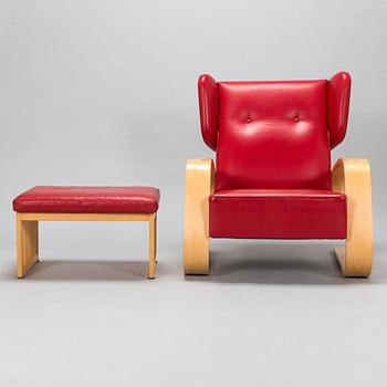 Alvar Aalto, nojatuoli ' High back tank'  E400 för Artek 1999. Ben af Sculten, rahi 445 Artek 1999.