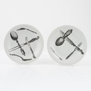 Piero Fornasetti, a pair of porcelain 'Posate Rinascimento' dishes, Fornasetti, Italy.