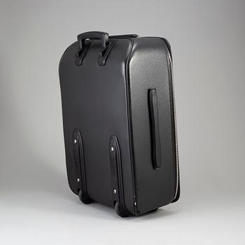 A black ardosie Leather Pégase 55 Suitcase.