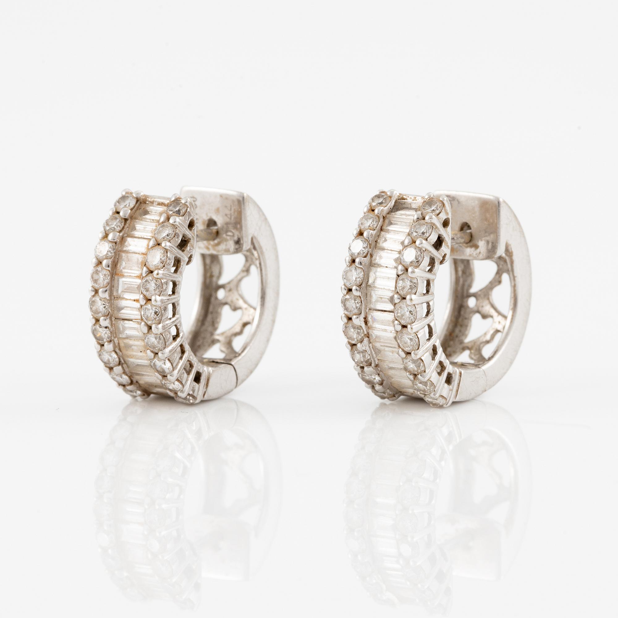 Earrings, a pair, 18K white gold set with baguette and brilliant-cut diamonds.