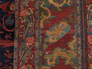 CARPET. Antique Bidjar. 578 x 355 cm, plus one end has 3 cm red flatweave, one has 1,5 cm.