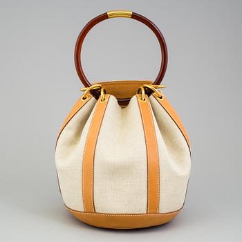 A Gucci canvas and leather bag, 1990's.