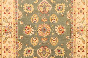 A Kazak carpet, c. 304 x 195 cm.