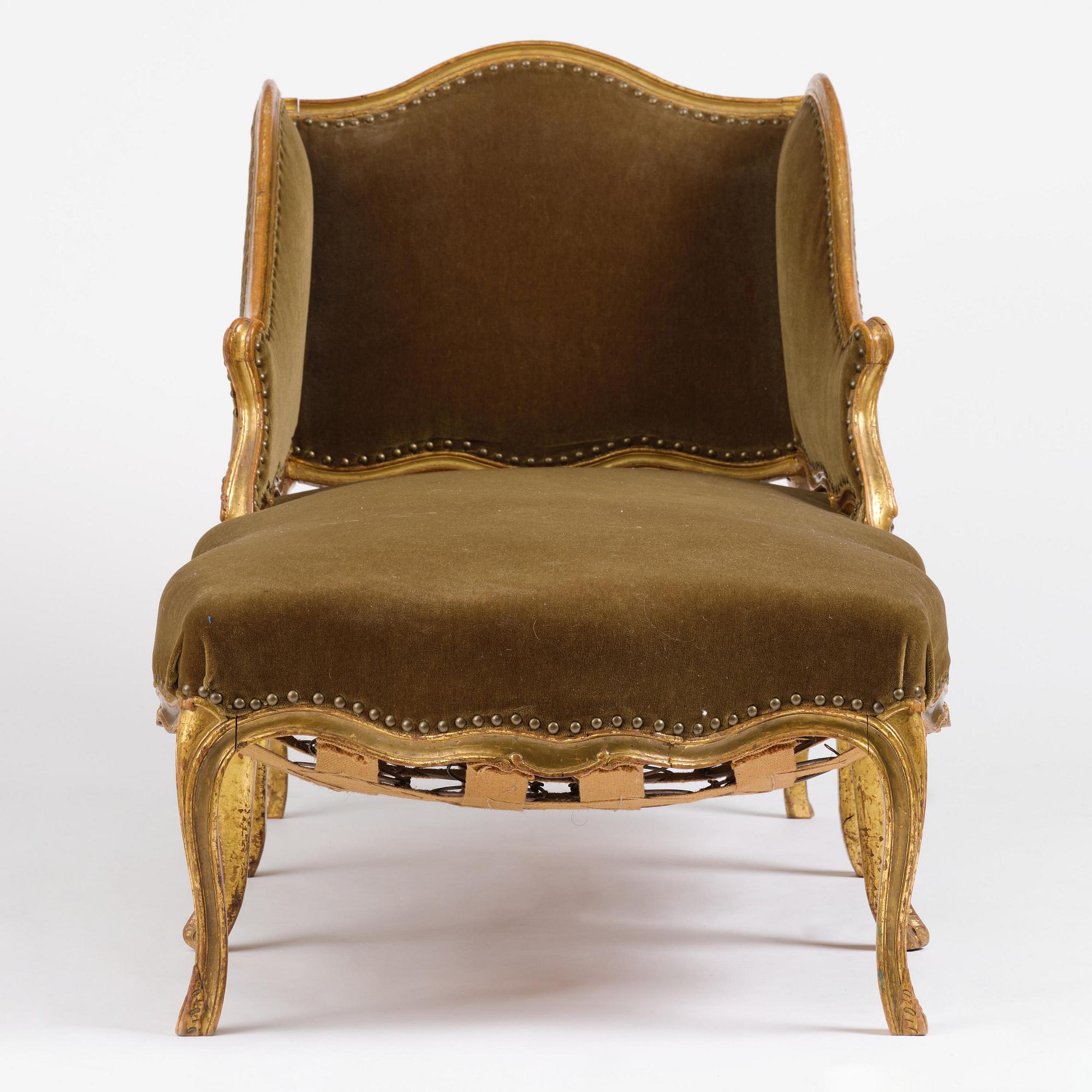 A French Louis Xv giltwood lit de repos, later part 18th century.