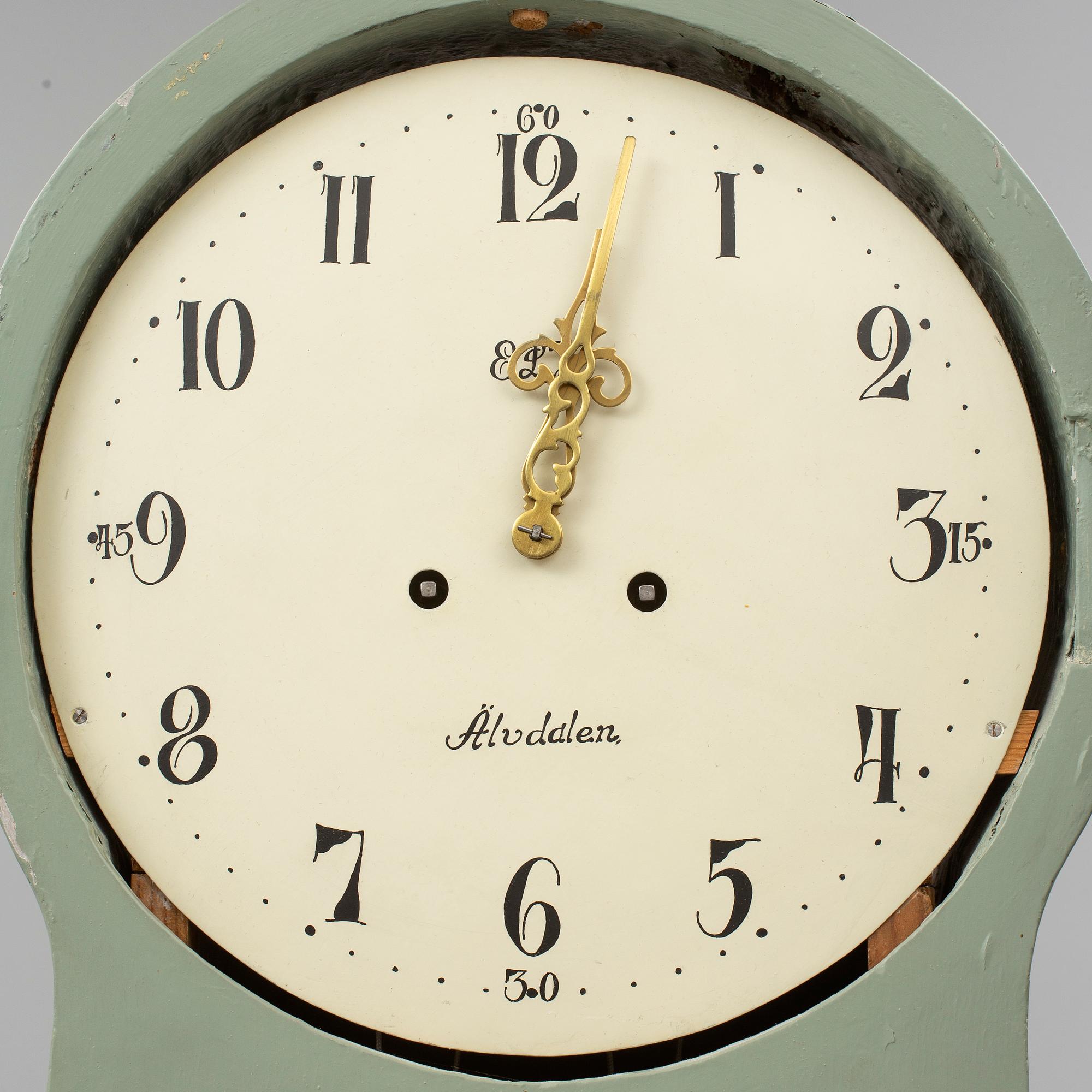 A combined clock and chest of drawers from late 19th  century.