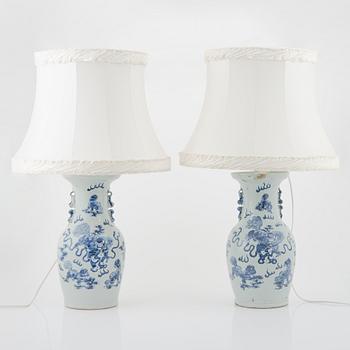 A pair of Chinese vases, mounted as lamps, early 20th Century.