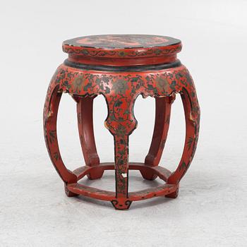 A Chinese red lacquer stool/table, 20th Century.