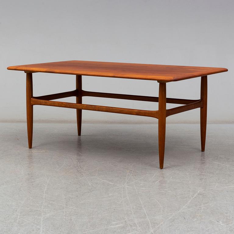 a teak coffee table from Denmark in the second half of the 20th century.