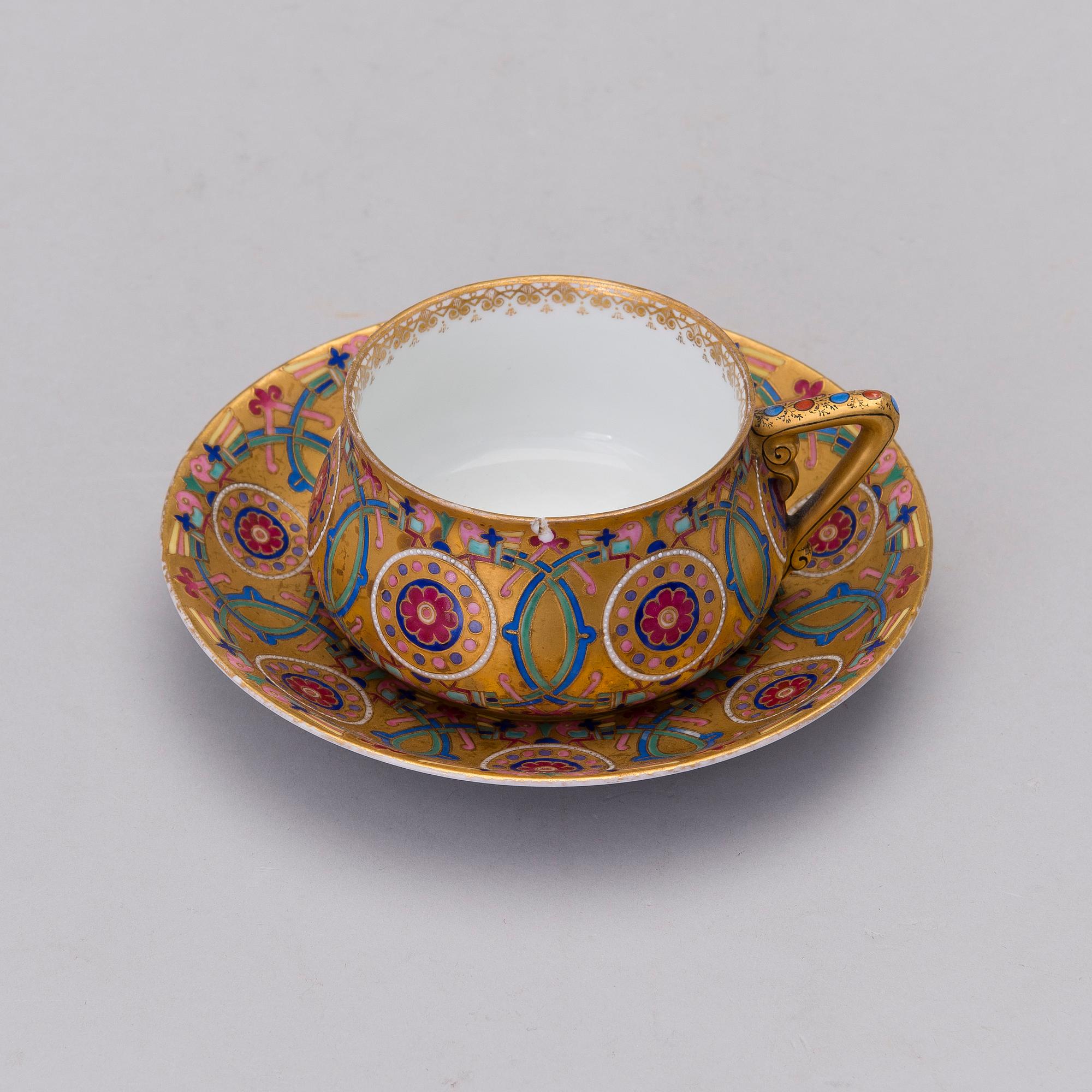 A Kuznetsov porcelain cup with saucer, Dmitrov factory, Russia 1894-1917.
