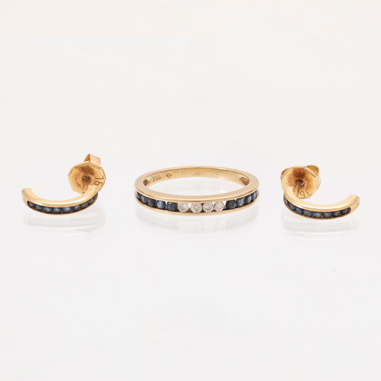 An 18K gold ring and a pair of earrings by H. Stern set with round brilliant cut diamonds and sapphires.