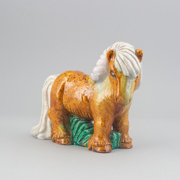 Gunnar Nylund, a stoneware sculpture of a work horse for Rörstrand signed.