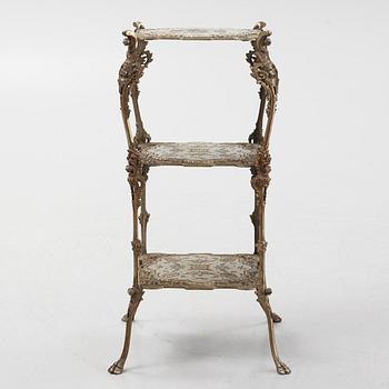 A three-tiered metal pedestal, first half of the 20th century.