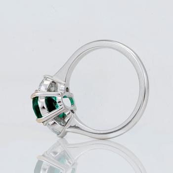 A circa 2.29ct emerald and brilliant cut diamond ring.