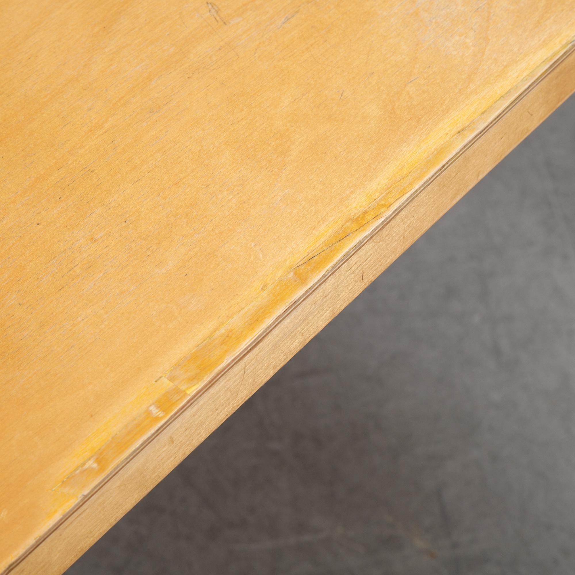 Alvar Aalto, a birch dining table, Artek, Finland, mid 20th Century.