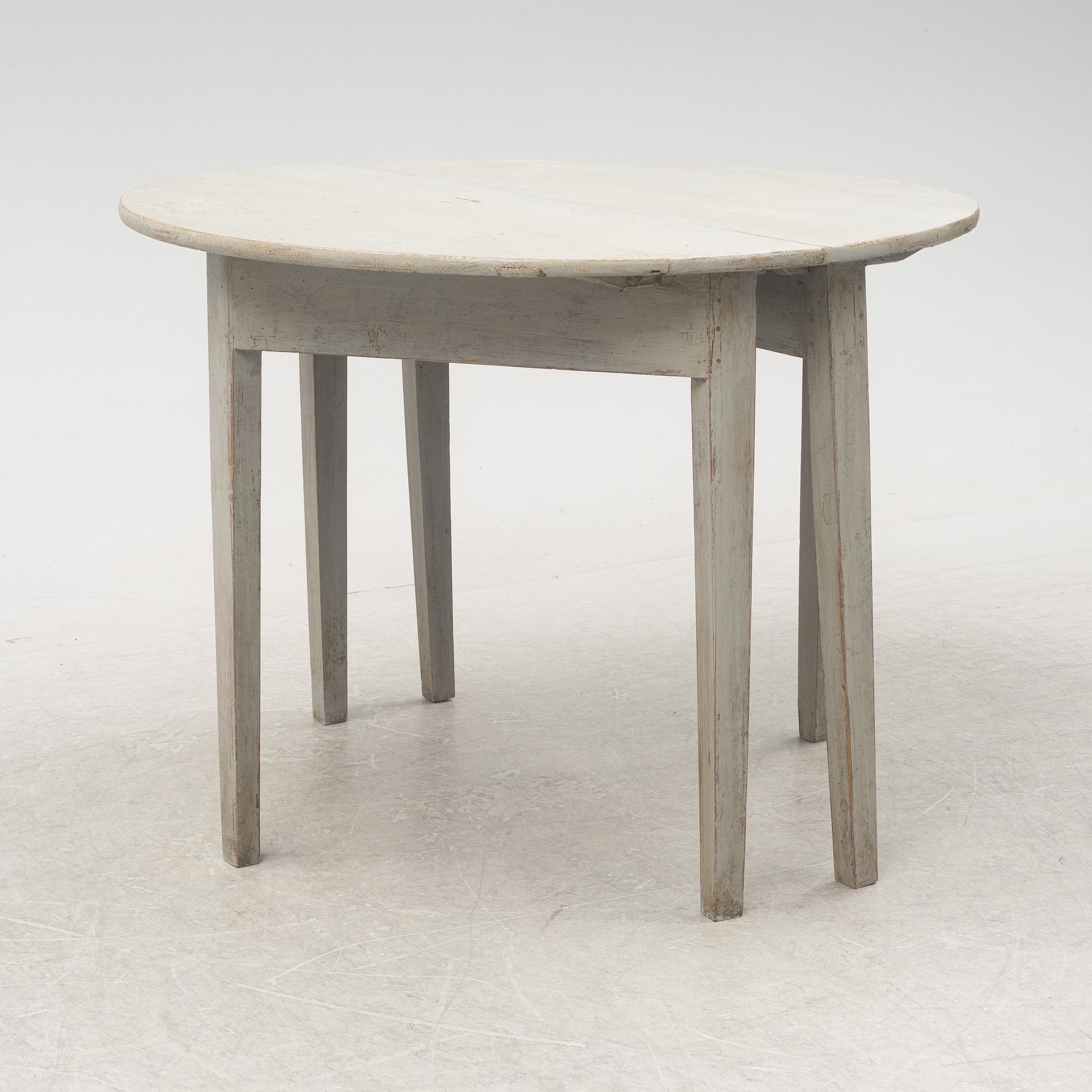 A pair of half circular tables, 19th Century.