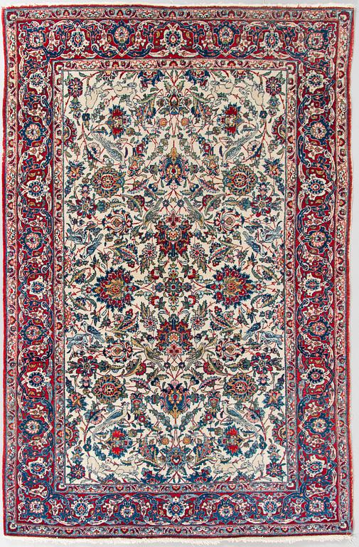 A semi-antique Isfahan carpet, 220x145 cm.
