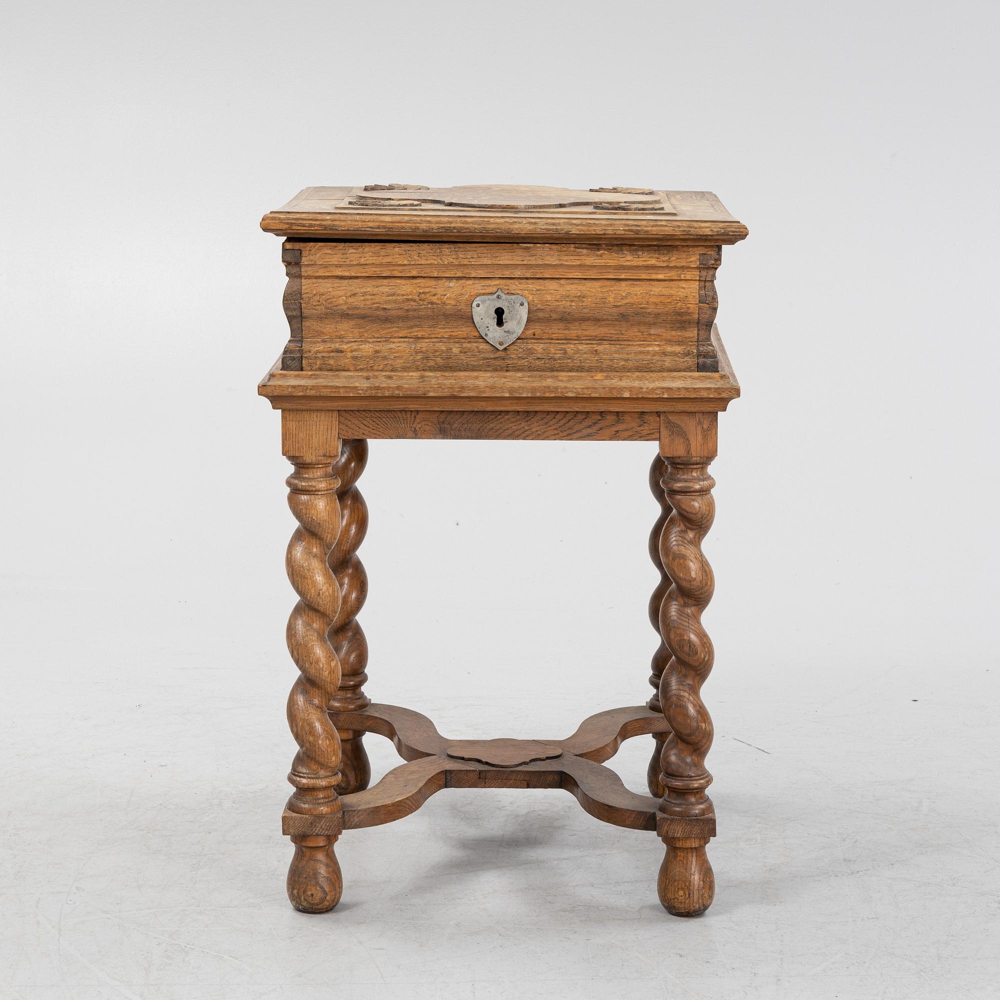 A baroque style oak chest, around 1900.