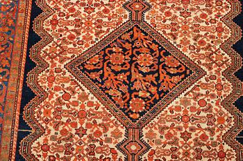 A rug, antique Malayer, ca 201,5 x 131,5 cm.