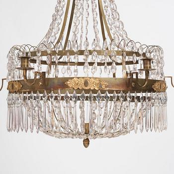 A late Gustavian gilt brass and cut glass seven-light chandelier, circa 1800.