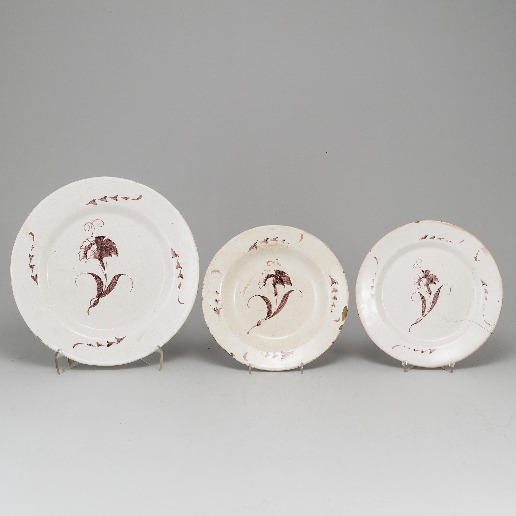 A Swedish faience serving dish and six plates, 18th Century.