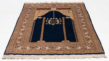 An oriental rug, c. 190 x 125 cm.