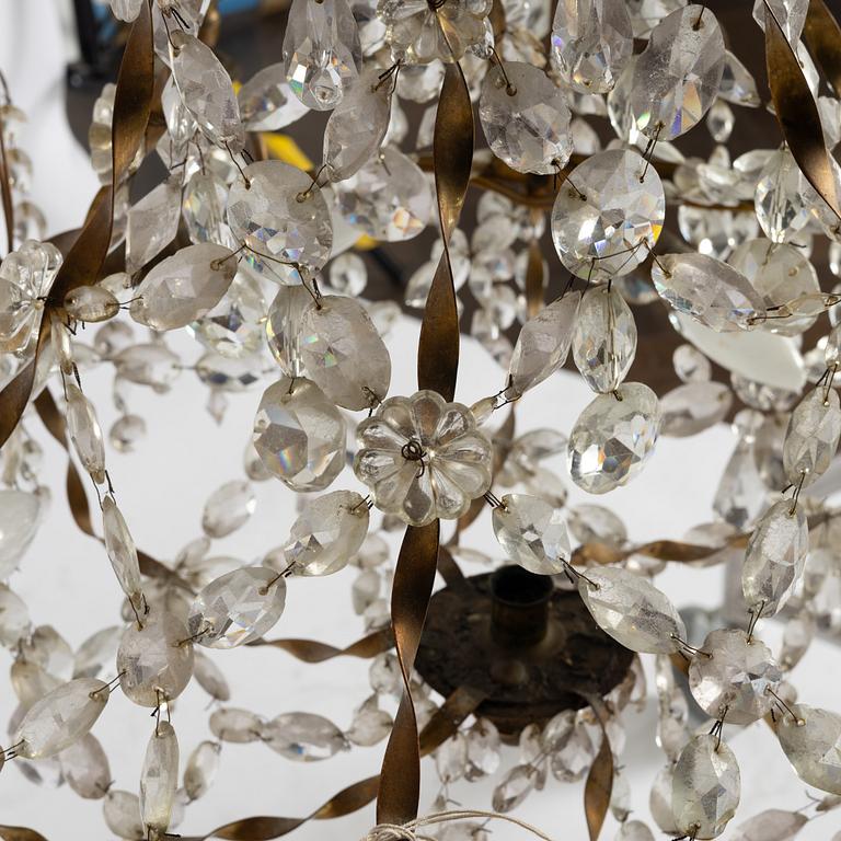 A late Gustavian gilt brass and cut glass seven-light chandelier, Stockholm, late 18th century.