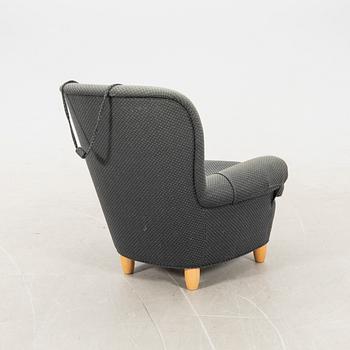 Carl Malmsten, armchair "Jättepaddan" OH Sjögren, circa 2000.