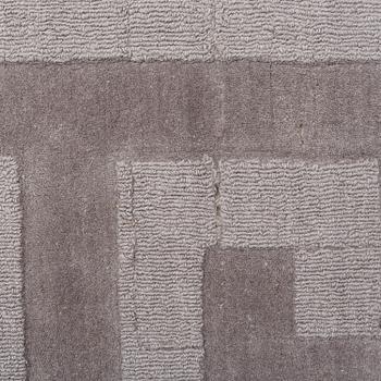 A Layered "Wool Cubes" carpet, 390x620 cm.