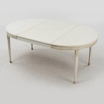 A Gustavian style dining table, mid 20th century.