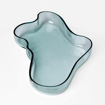 Alvar Aalto, a green tinted glass dish, model 9748 for Karhula Glassworks, Finland, in production 1937-1949.