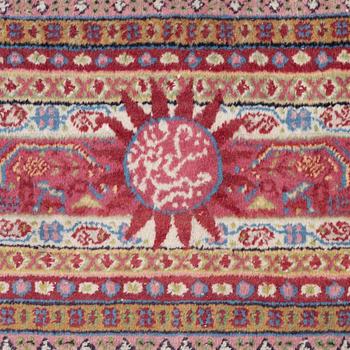 A oriental carpet, signed, c. 295 x 295 cm.