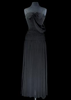1274. A black silk long dress by Yves Saint Laurent.