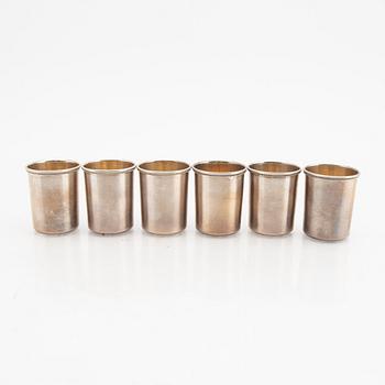 An eraly 20th century set of six silver cups mark of  Ivan Ekimovich Morozov St Petersburg weight 130 grams.