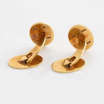 A pair of cufflinks 18K gold.