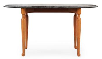 739. A Josef Frank black marble top table, Svenskt Tenn.