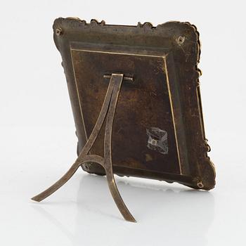 A late Empire ormolu frame with an officer's portrait, 1830's/40's.