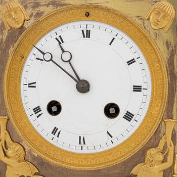 A French Empire gilt bronze mantle clock, early 20th Century.