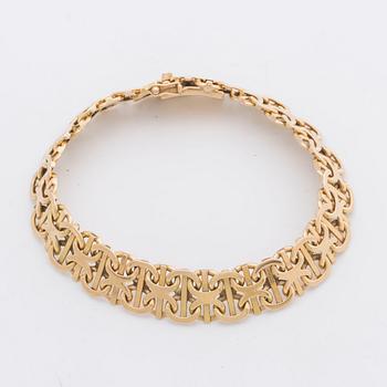 An 18 Carat gold bracelet weight ca 33,4 gr.