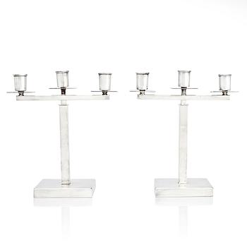 348. Rolf Engströmer, attributed to, a pair of silver plated candelabra, Fabriksaktiebolaget Kronsilver, Sweden 1930s.