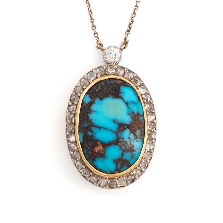 A turquoise pendant in platinum and 14K gold set with old- and rosecut diamonds.