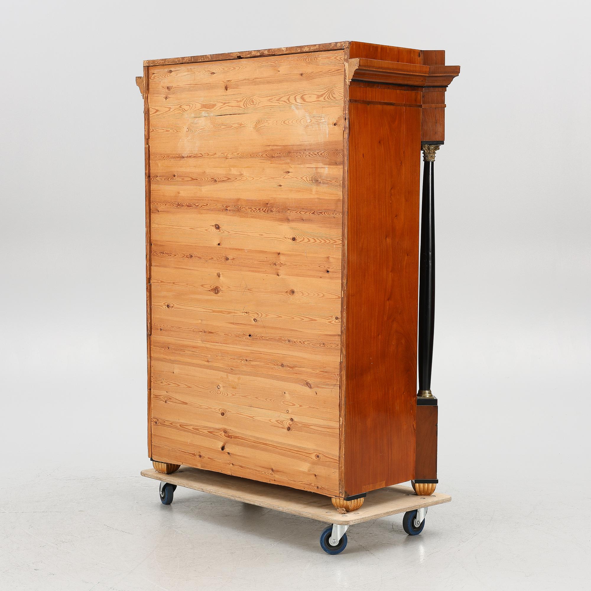 A secretaire, Empire-style, first half of the 20th century.