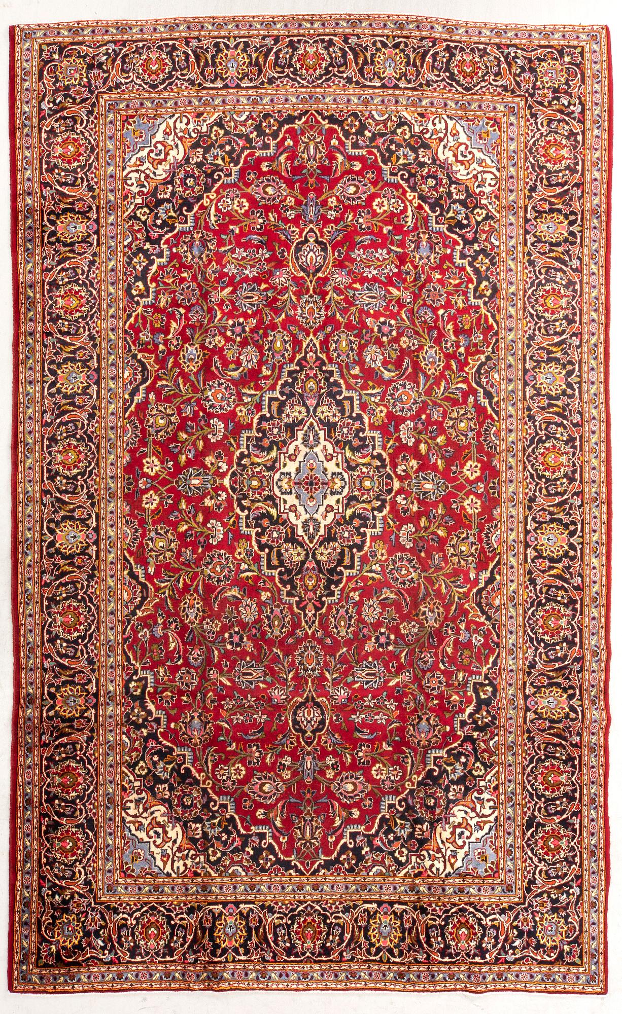 An old Kashan carpet approx 388x270 cm.