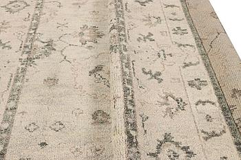 An oriental carpet with Mamluk-design, c. 360 x 280 cm.